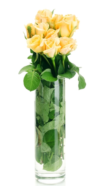 Beautiful bouquet of roses in transparent vase isolated on white