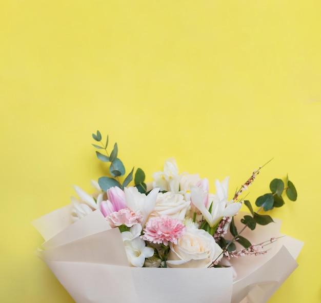 Beautiful bouquet on yellow background