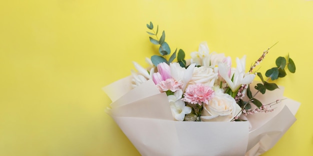 Beautiful bouquet on yellow background