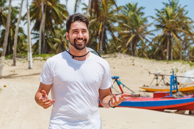 Beautiful boy on the beach on vacation