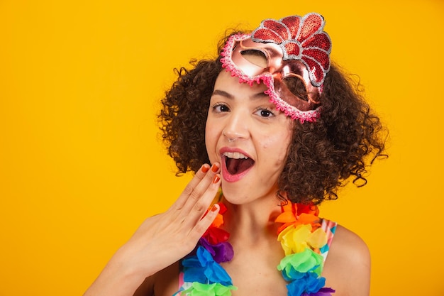 Beautiful brazilian woman dressed in carnival clothes closeup photo on her face selfie