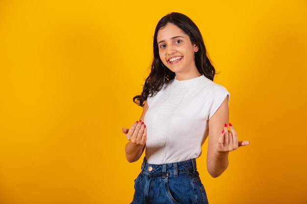 Beautiful brazilian woman inviting with hands