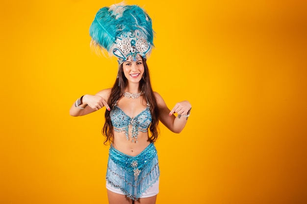 Beautiful brazilian woman with queen clothes from samba school carnival crown of feathers only