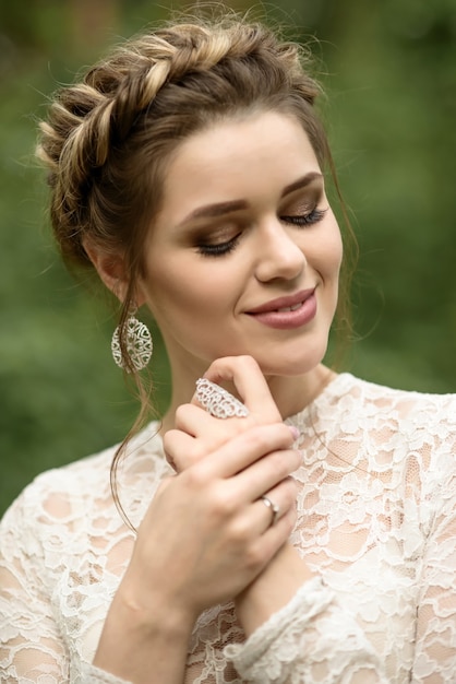 Beautiful bride portrait green background