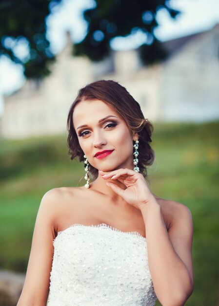 Beautiful bride posing outdoors