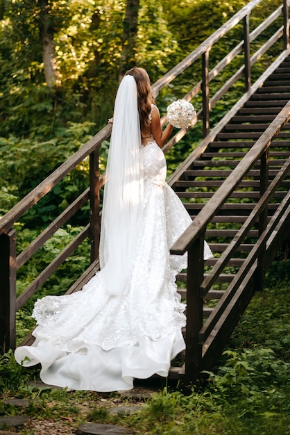 a beautiful bride on the stairs