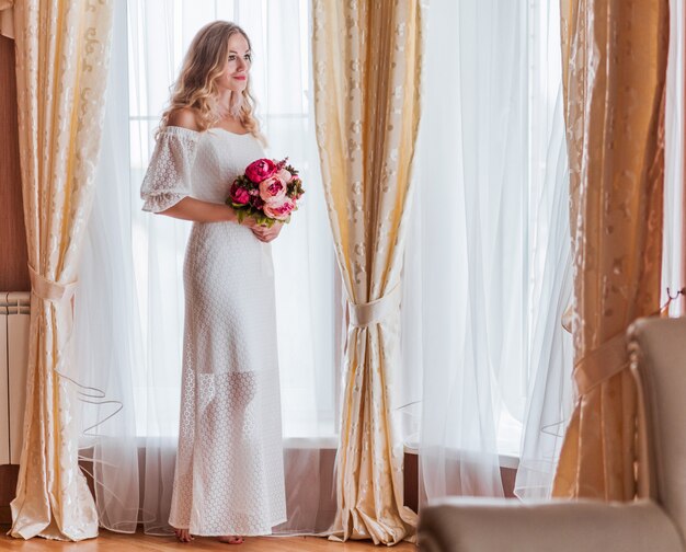 Beautiful bride in the wedding dress