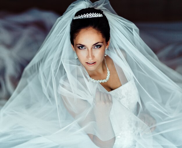 Beautiful bride. Wedding hairstyle and make up.