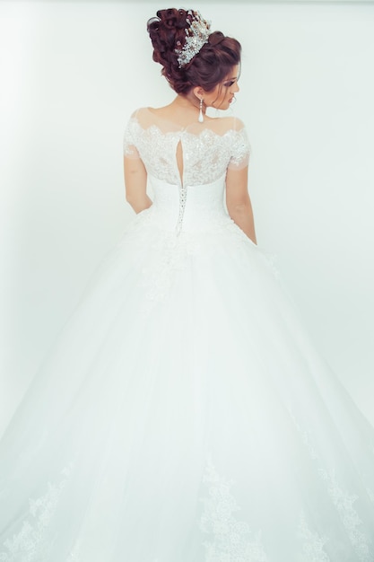 Beautiful bride on a white background