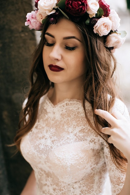 Beautiful bride in white dress with wreath on her headx9