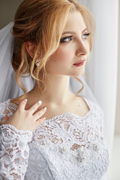 Beautiful bride in white wedding dress 