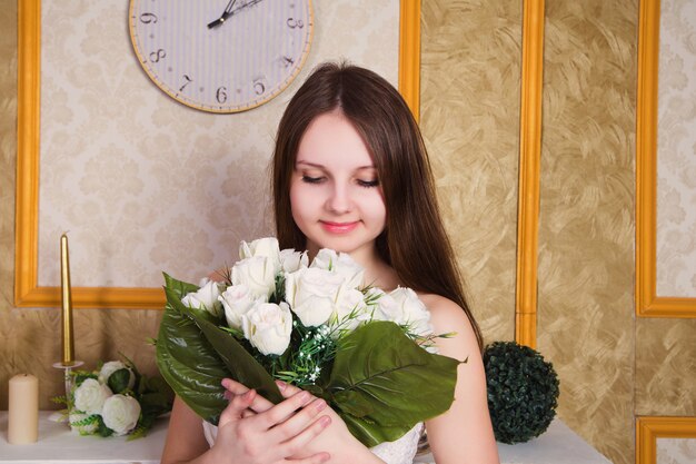 Beautiful bride with flower bouquet