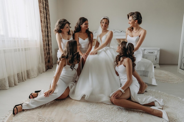 Beautiful bride with her pretty bridesmaids