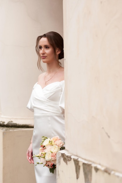 Beautiful bride with wedding bouquet