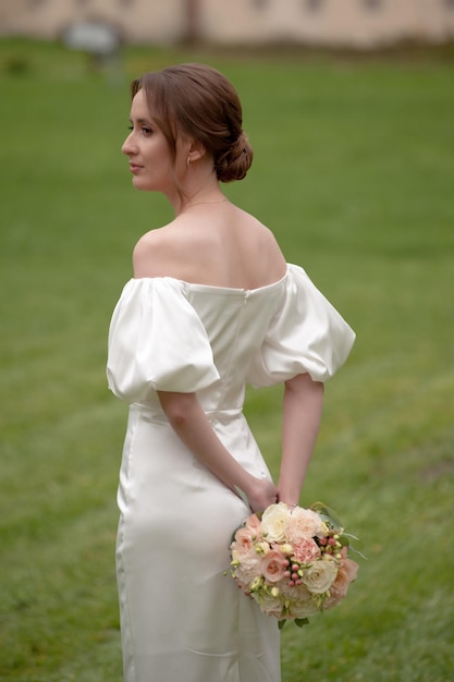 Beautiful bride with wedding bouquet