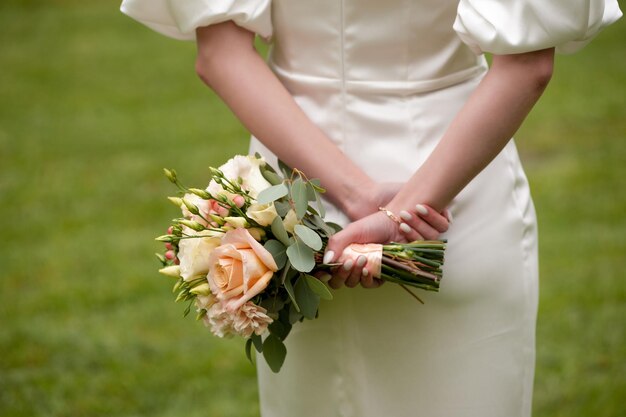 Beautiful bride with wedding bouquet