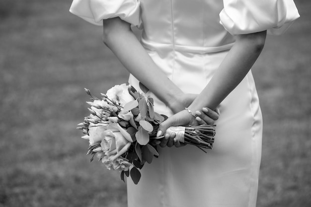 Beautiful bride with wedding bouquet