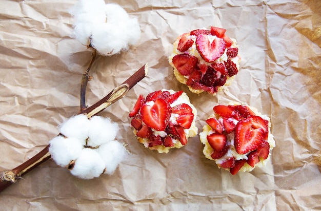 Beautiful and bright cupcakes with strawberries delicious and simple