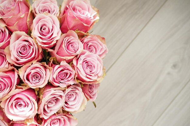 Photo beautiful bright floral background bouquet of pink roses closeup with space for text