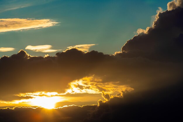 Beautiful bright sunset panoranic sunrise sky with colorful\
clouds