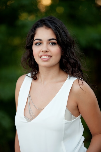 Beautiful brunette girl relaxing in the park