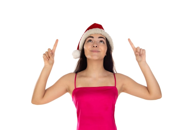 Beautiful brunette girl in santa claus hat isolated on white background with copy space