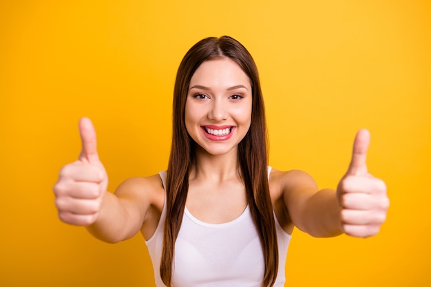 beautiful brunette posing isolated on orange