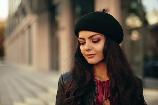 Beautiful brunette woman dressed in retro style