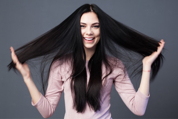 Beautiful brunette woman with  long hair