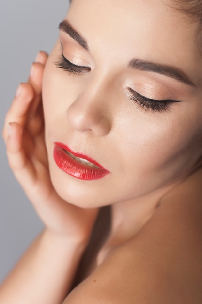 Beautiful Brunette Woman With Red Lipstick