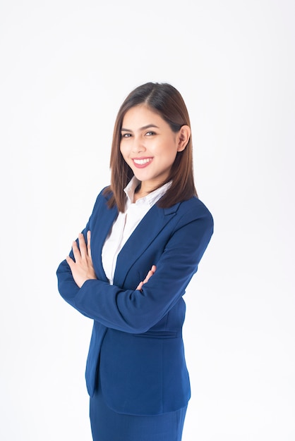 Beautiful Business Woman in blue suit is smiling on white  background