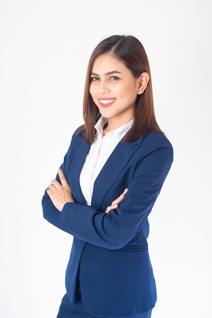 Beautiful Business Woman in blue suit is smiling on white  background