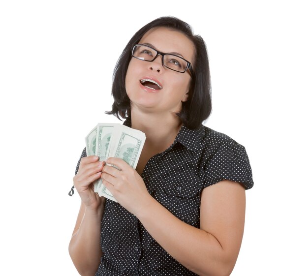 Beautiful Business Woman in Glasses with Dollars Banknotes in Her Hands on a white background