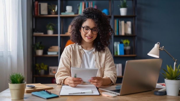 Beautiful business woman working at home multitasking freelance and motherhood concept