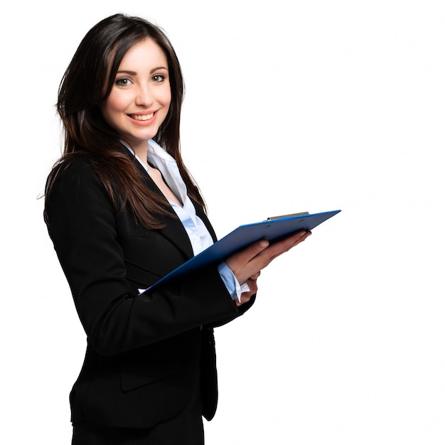 Beautiful businesswoman portrait isolated on white and holding a clipboard