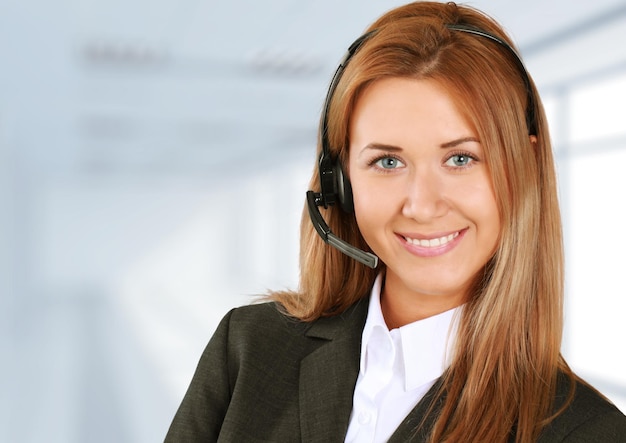 Beautiful businesswoman portrait  with headset , isolated.