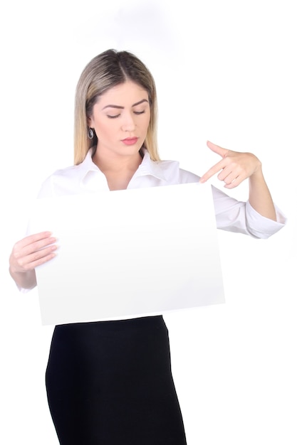 Beautiful businesswoman showing white empty paper