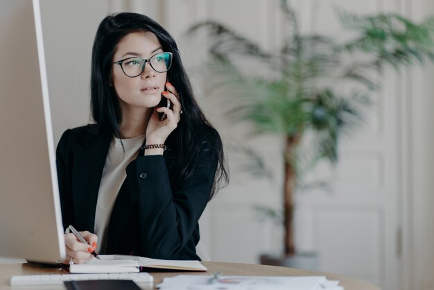 Beautiful businesswoman at the workplace