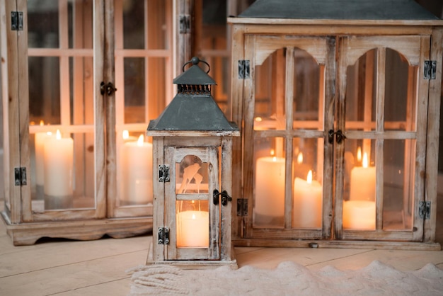 Beautiful candlesticks with lighted candles a warm and cozy photo