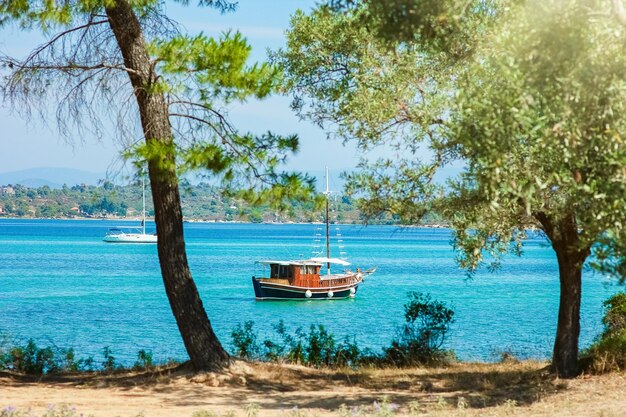 A beautiful caravan yacht at sea on nature greece background