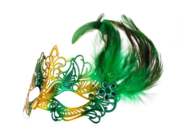 Photo beautiful of carnival mask with feather isolated on a white background.