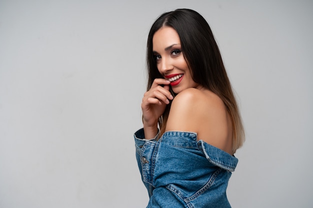 Beautiful caucasian girl denim jacket posing  