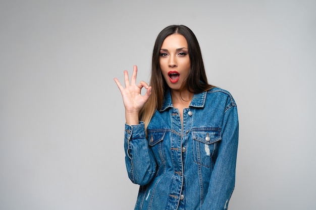 Beautiful caucasian girl denim jacket posing  