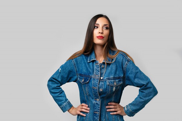 Beautiful caucasian girl denim jacket posing  