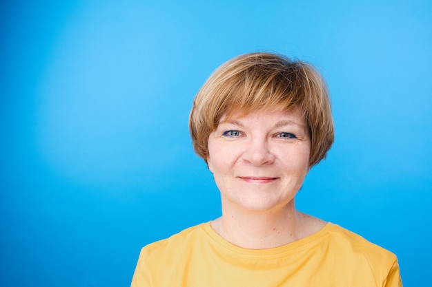 Beautiful caucasian woman on blue