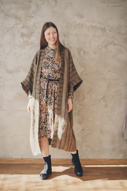 Beautiful caucasian woman in Japanese kimono and black shoes.