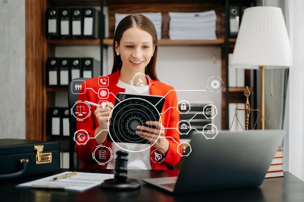 Beautiful caucasian woman lawyer working and gavel tablet laptop in front advice justice and law concept in office