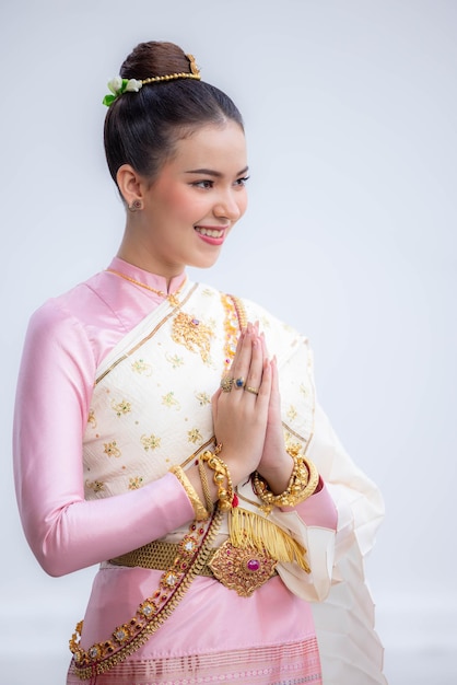 Beautiful caucasian woman in traditional Thai costume culture Beautiful asian woman Thailand