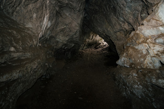 Beautiful cave. View from inside dark dungeon. 