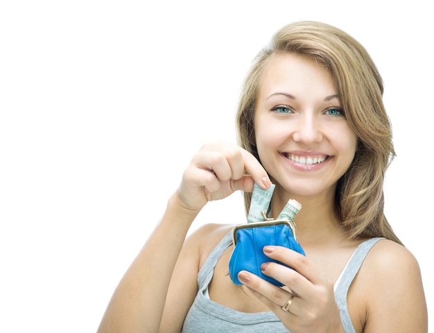 Beautiful cheerful girl holding a purse